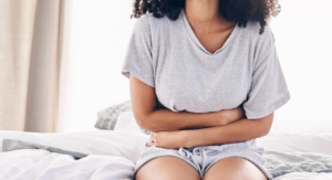 woman experiencing period pain